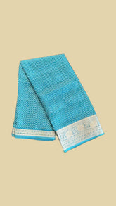 Teal Green Dot Zig Zag Pattern with Floral Gold Brocade Traditional Border Fancy Georgette Saree